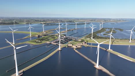 aerial view of a large wind farm and water infrastructure