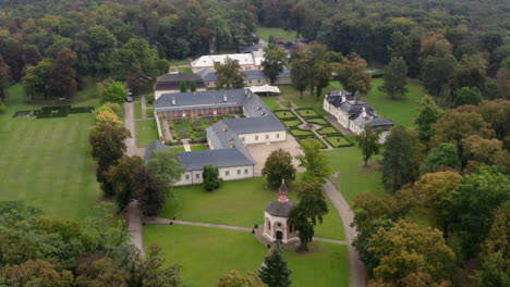 approaching the private, magical, beautiful wedding venue, chateau bon repos, aerial pan down