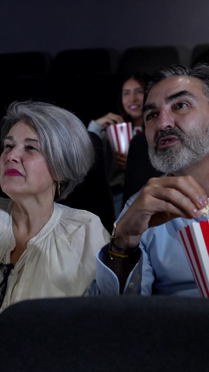 People enjoying a movie at the cinema