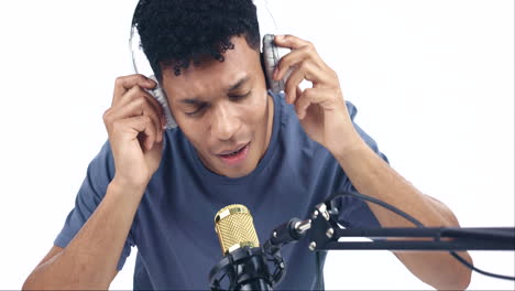 Young-man,-musician-and-microphone-in-studio