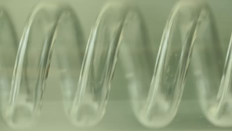 close-up of a clear glass spiral tube