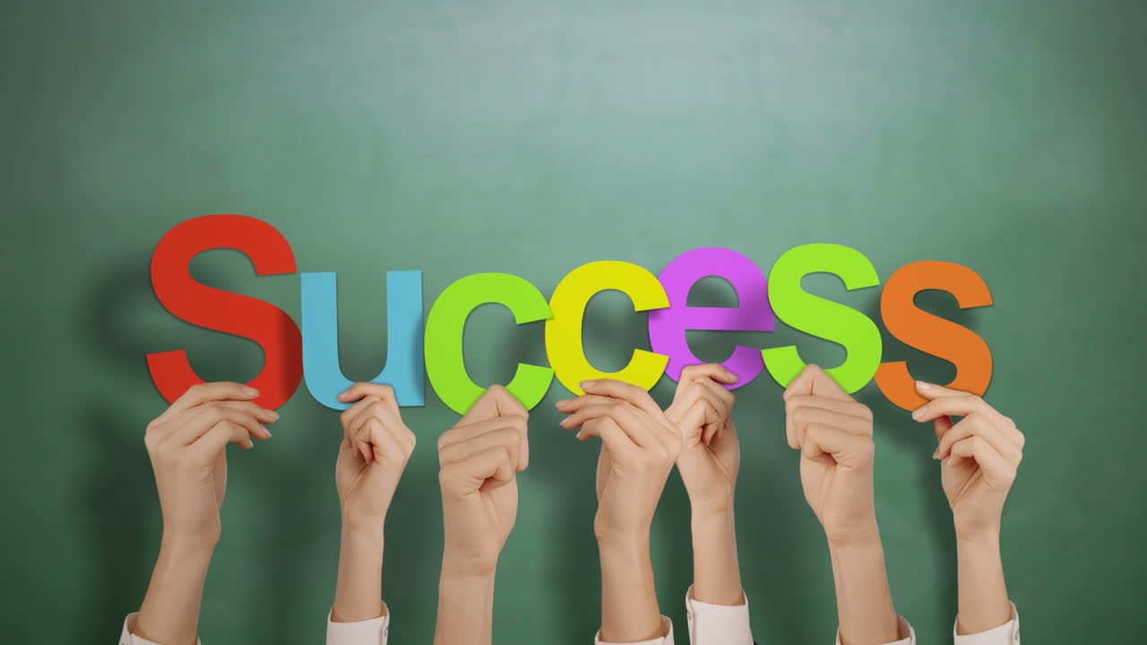 Hands holding up success