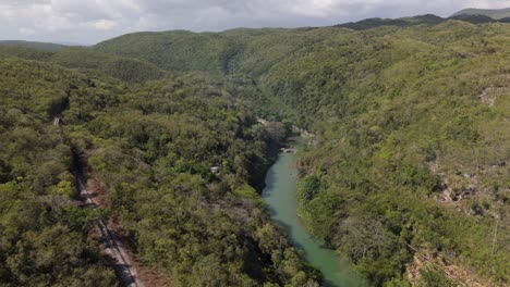 wide angel view of flat bridge between mountains in bog walk jamaica