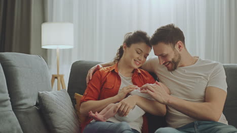 happy parents with their newborn baby