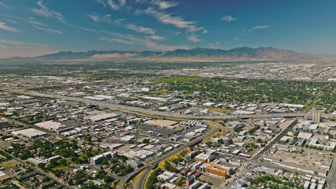 Salt Lake City Utah Skyline at Day, Mountains Behind, Aerial Drone
