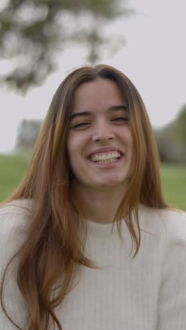 happy young woman expressing joy outdoors