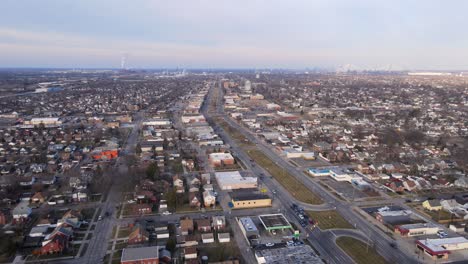 Aerial-view-of-Fort-Street-in-Lincoln-Park,-Michigan-on-a-Sunny-Evening-Light