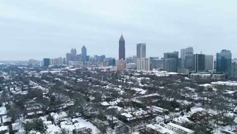 Static aerial shot of the snow covered Midtown skyline in Atlanta, Georgia on January 10th 2025.