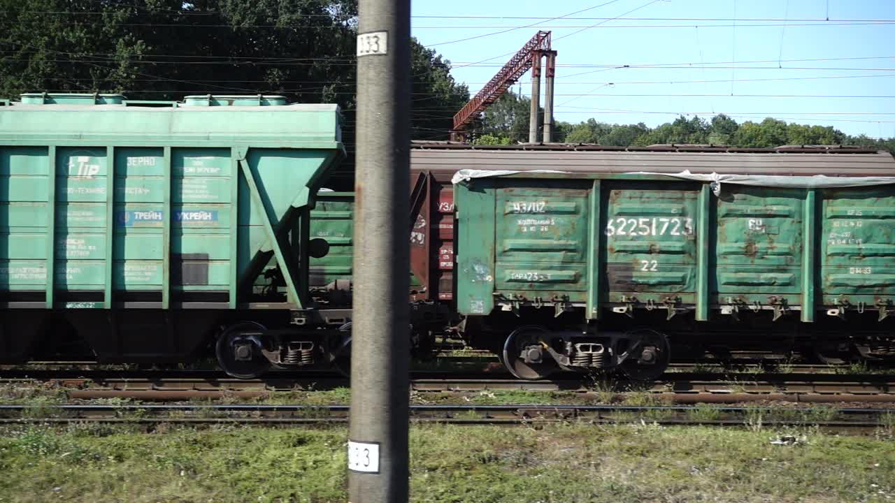 Cargo carriage of the railway train. Shooting in the movement