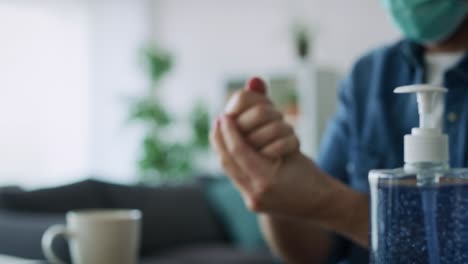 man cleaning his hands before start working