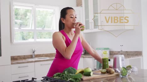 Animation-of-vibes-text-with-asian-woman-drinking-healthy-juice