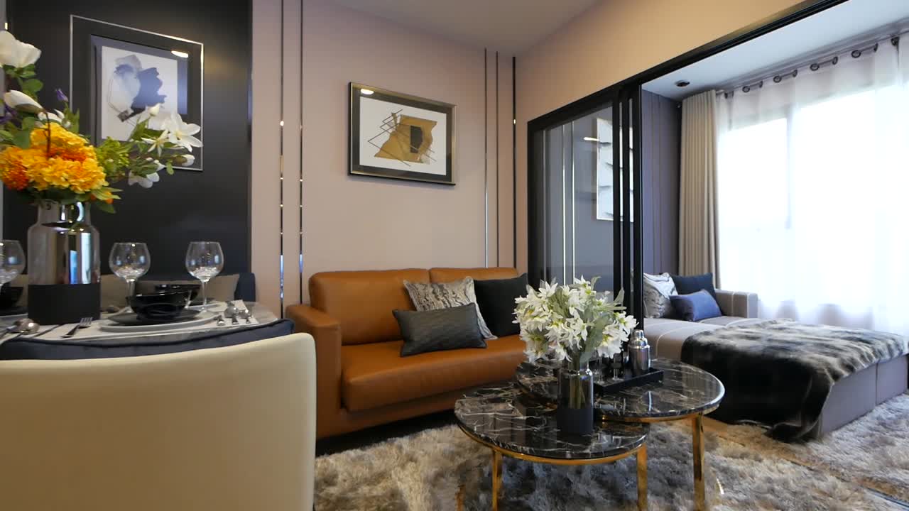 recorrido de apartamentos con estilo que muestra el dormitorio, la sala de estar y el comedor