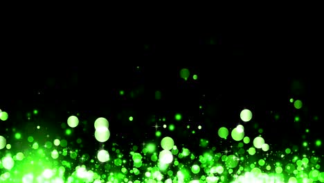 fondo con partículas verdes brillantes. hermoso fondo de luz bokeh. partículas brillantes en ascenso. confeti verde brillando con luz brillante mágica. bucle sin costuras