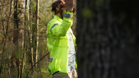 rescue team guide leading way into the forest area to find clues during manhunt