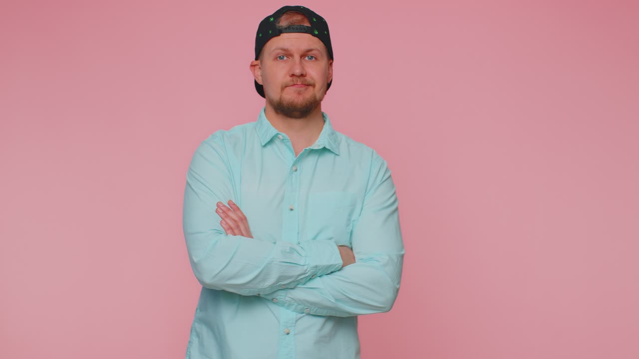 Friendly man outstretching hand to camera offering handshake greeting with kind smile welcoming