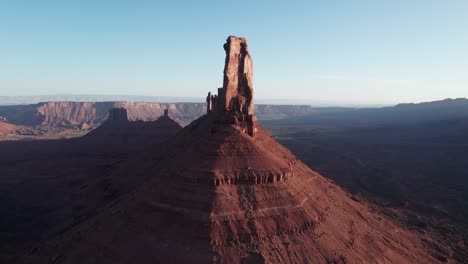 flyover of castleton tower and the surrounding desert landscape