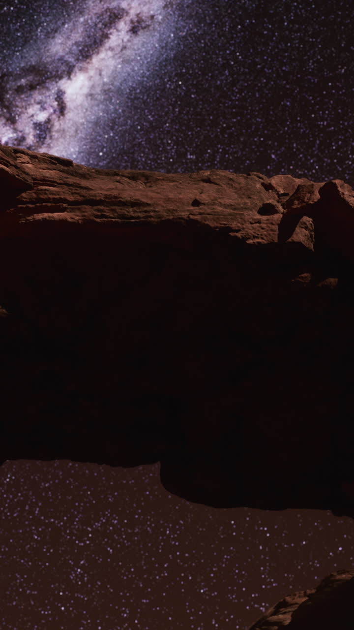vía láctea sobre un arco de roca