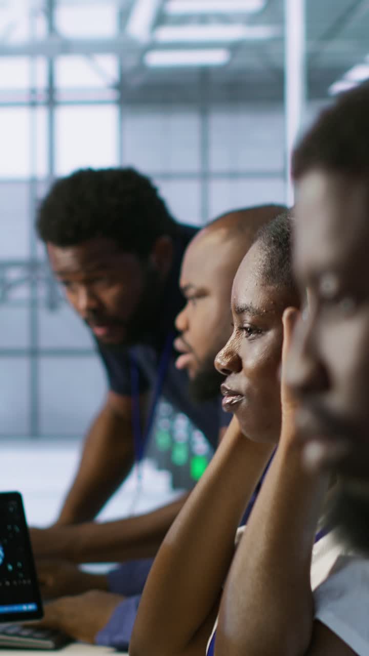 Vertical video Focus on server hub employee developing disaster recovery plans