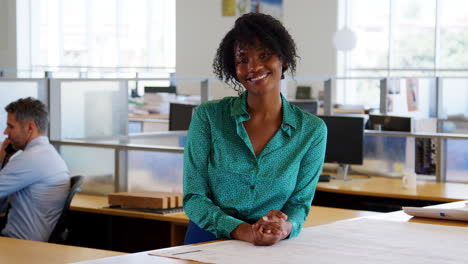 Young-smiling-Black-female-businesswoman-in-an-office