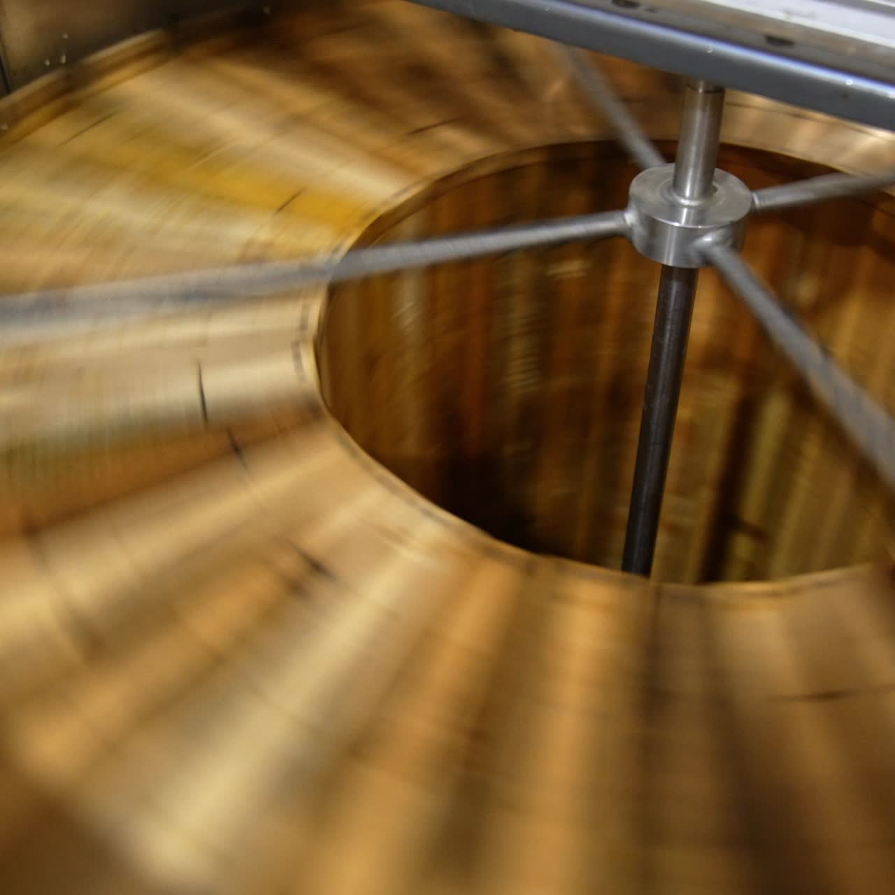 Working machine for honey extraction with frames inside. Special equipment for harvesting organic product at apiary farm