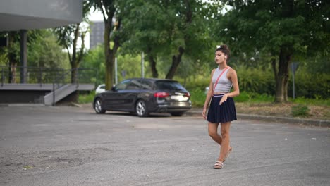 young woman walking in the city