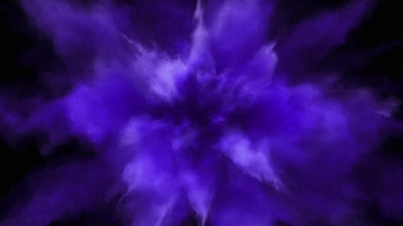 Lilla pulvereksplosion mod sort baggrund
