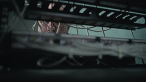 network technician working in a server room