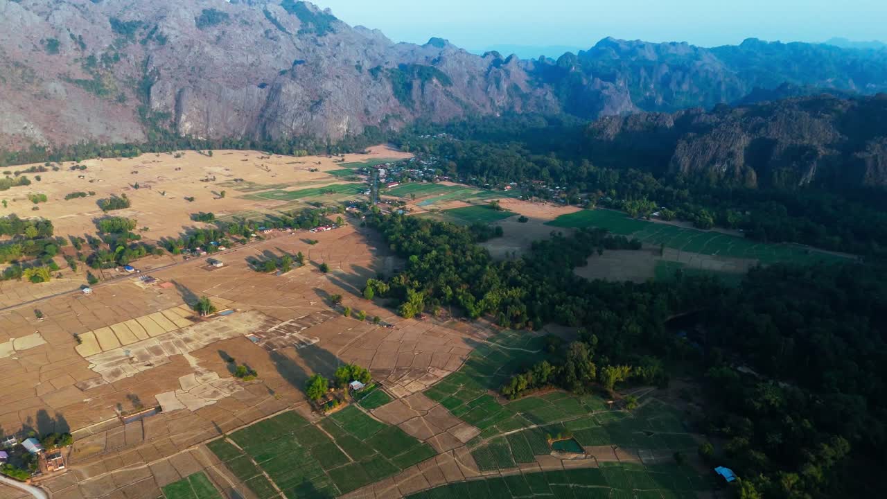 Aerial landscape of agricultural fields in Thakhek Loop Laos, famous motorbike route, Mountain valley