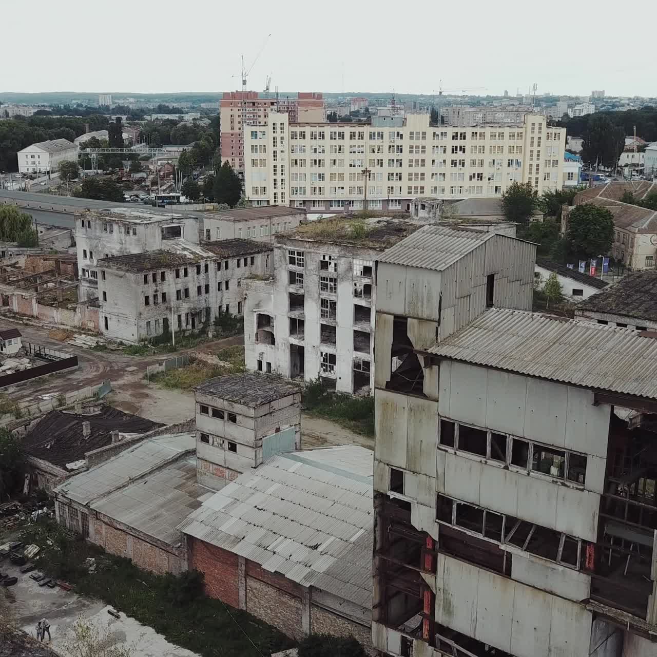 Flight over the destroyed factory. Old industrial building for demolition. Aerial view