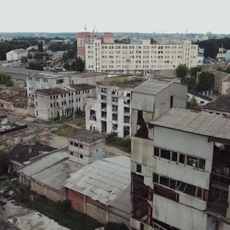 flight over the destroyed factory. old industrial building for demolition. aerial view
