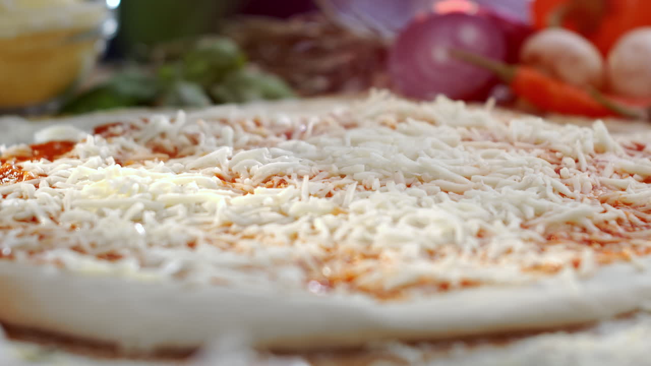 Pizza preparation with mushrooms and cheese
