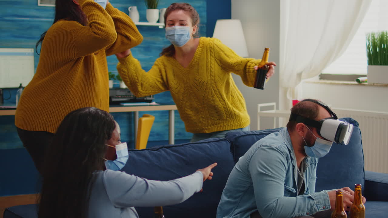 Multiethnic friends enjoying vr tehnology playing video games