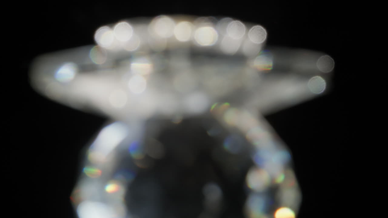 Spinning Glass Jewel Blurred Making Beam Lights Effects On Black