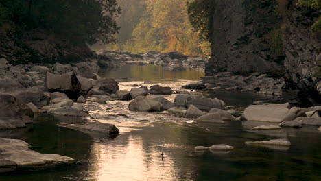 downstream view of stillaguamish river on peaceful autumn day