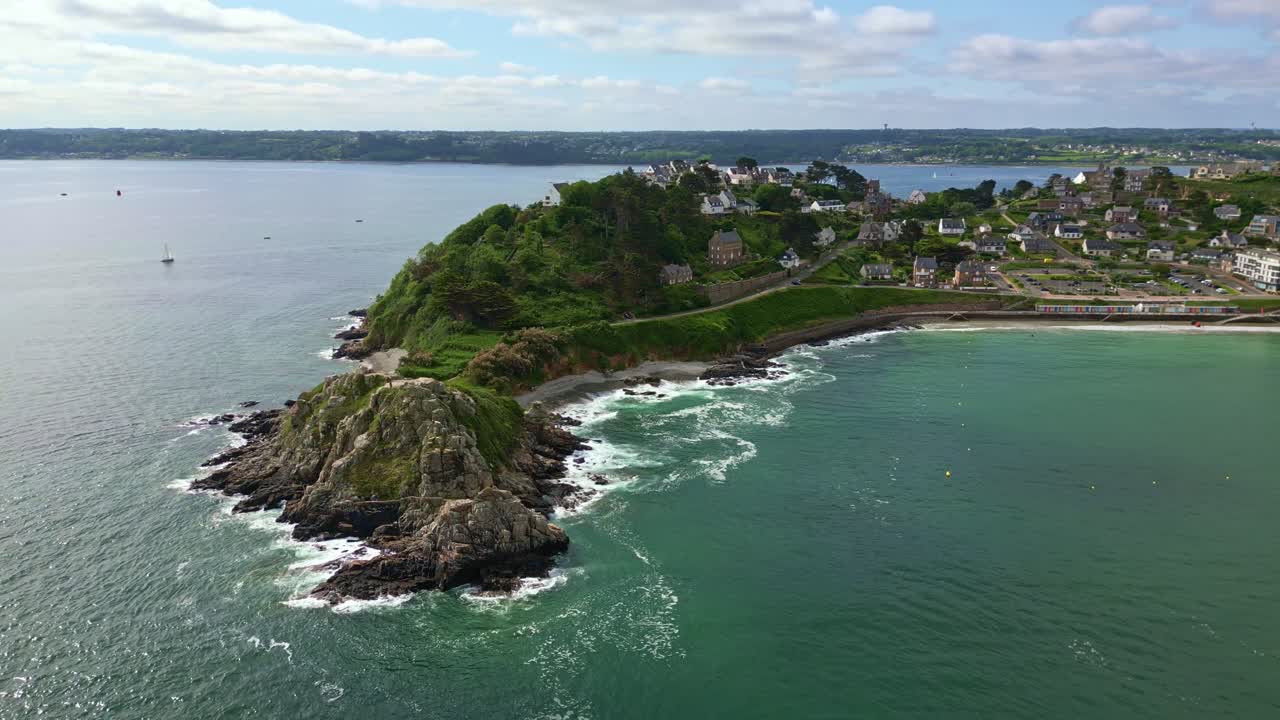 Descending drone movement to the endpoint of Pointe du Chateau northerly point at Perros-Guirec, Côtes-d'Armor, Brittany, France.