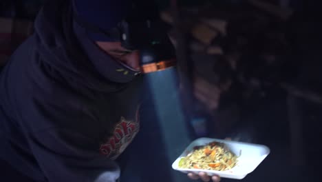 sherpas preparing food on the acatenango volcano in guatemala