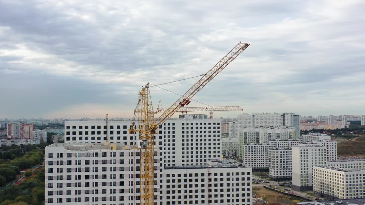 Residential complex, apartment houses under construction pan circular shot