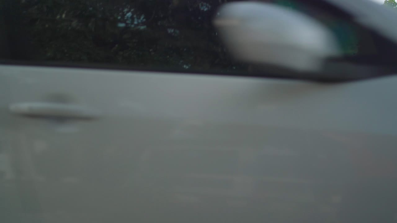 Man Walking on a City Bridge