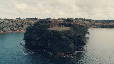 drone footage of abandoned fort at panama's biggest river entrance