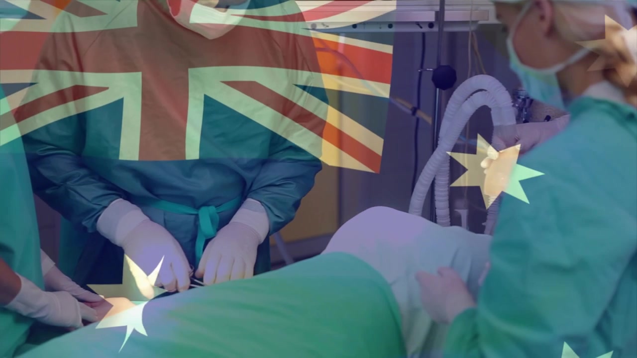 Medizinisches Fachpersonal führt Operation mit Überlagerung der australischen Flagge durch