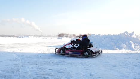 child go-karting on ice