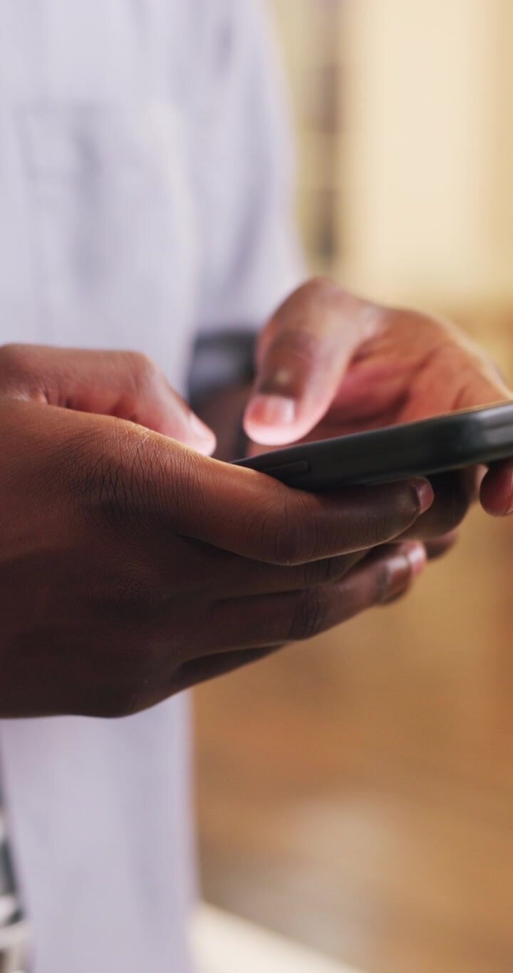 Close-up of Person Using Smartphone