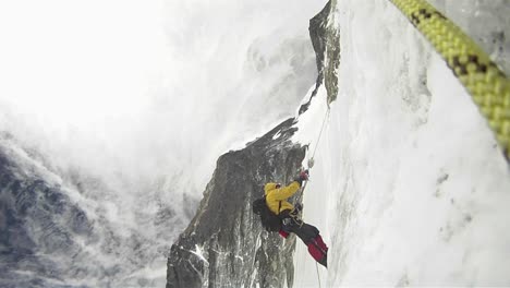 climber ascends into strong winds