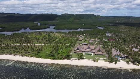 Beachfront-Island-Resort-in-Remote-Tropical-Nature,-Aerial-Drone-View