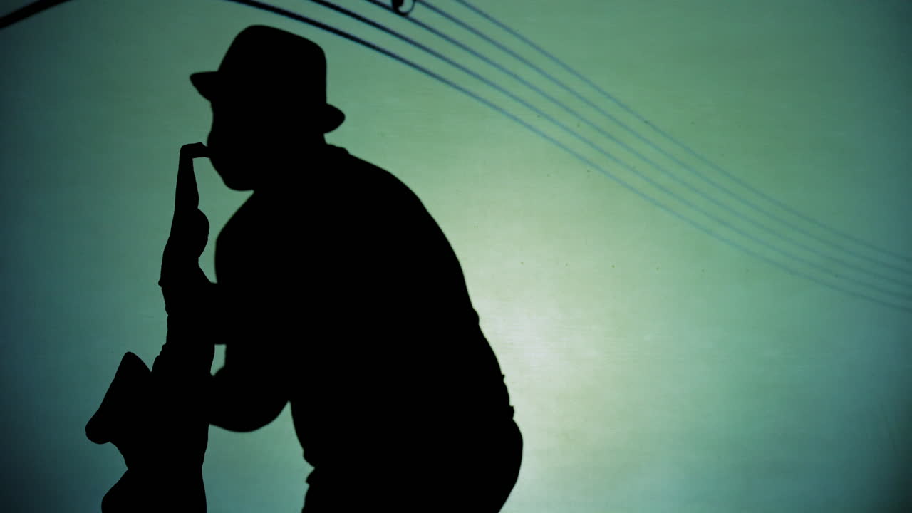 Silhouette of a musician playing saxophone