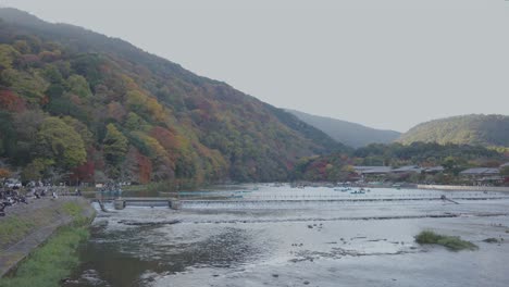 arashiyama river in autumn, kyoto japan