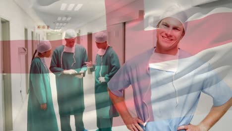 Animation-of-flag-of-england-waving-over-surgeons-in-operating-theatre