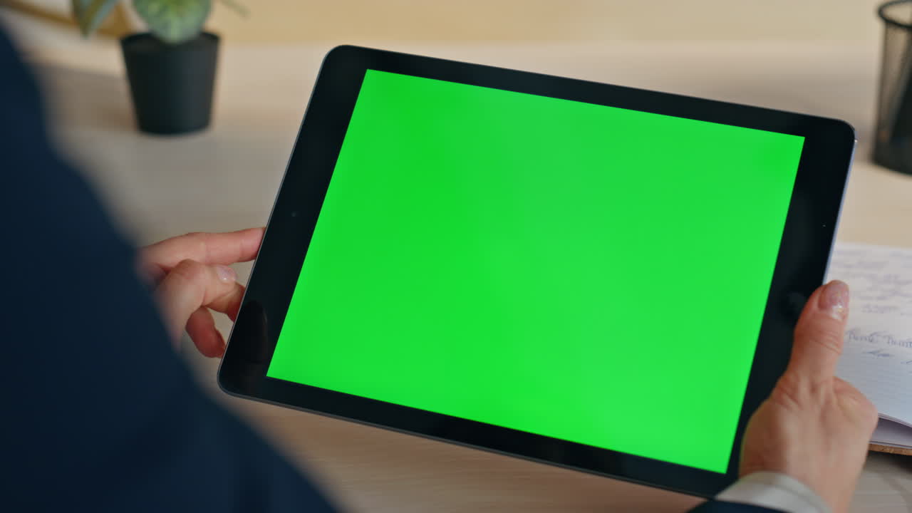 Woman touching mockup display with finger at house closeup. Girl holding tablet
