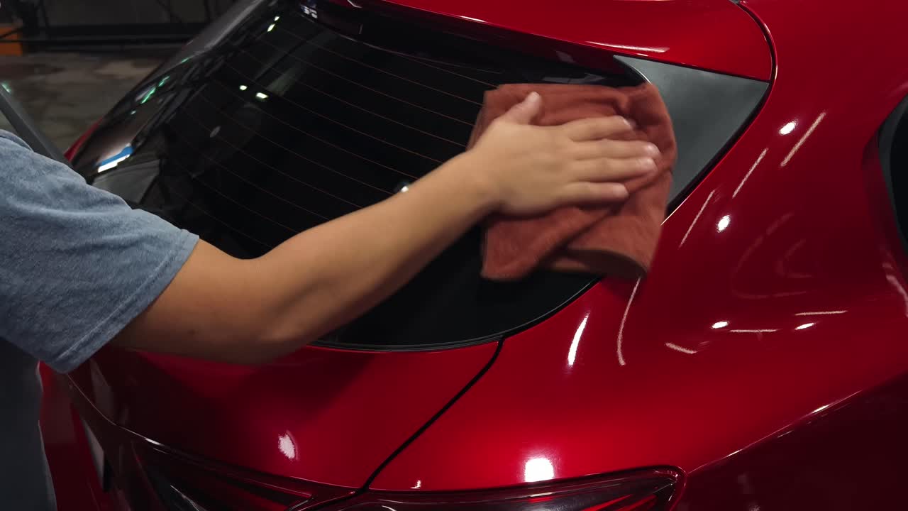 Car Detailing: Cleaning a Red Car
