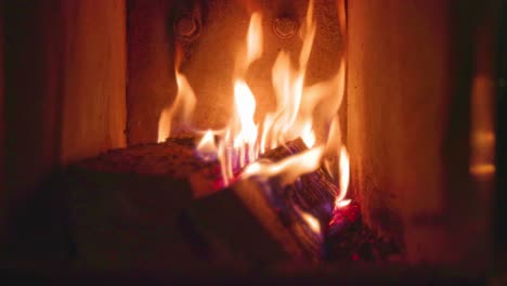 close up of wood burning in a fireplace